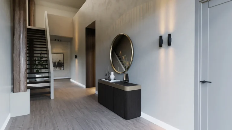 Entree met ronde spiegel boven een zwart dressoir, grijze wanden en een houten lattenwand.